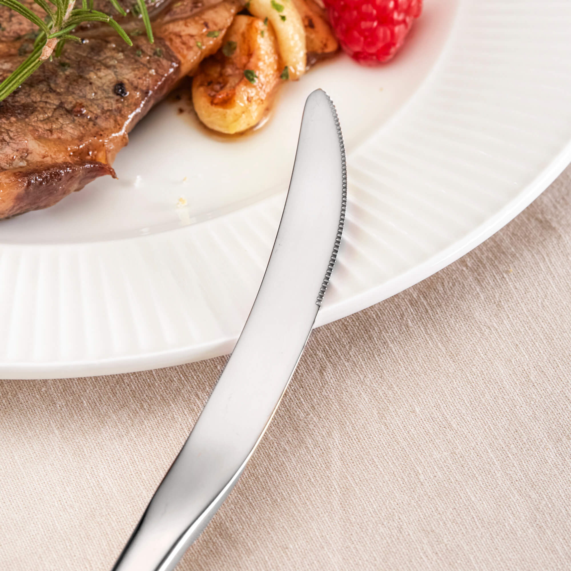 Crescent-shaped Dinner Knife